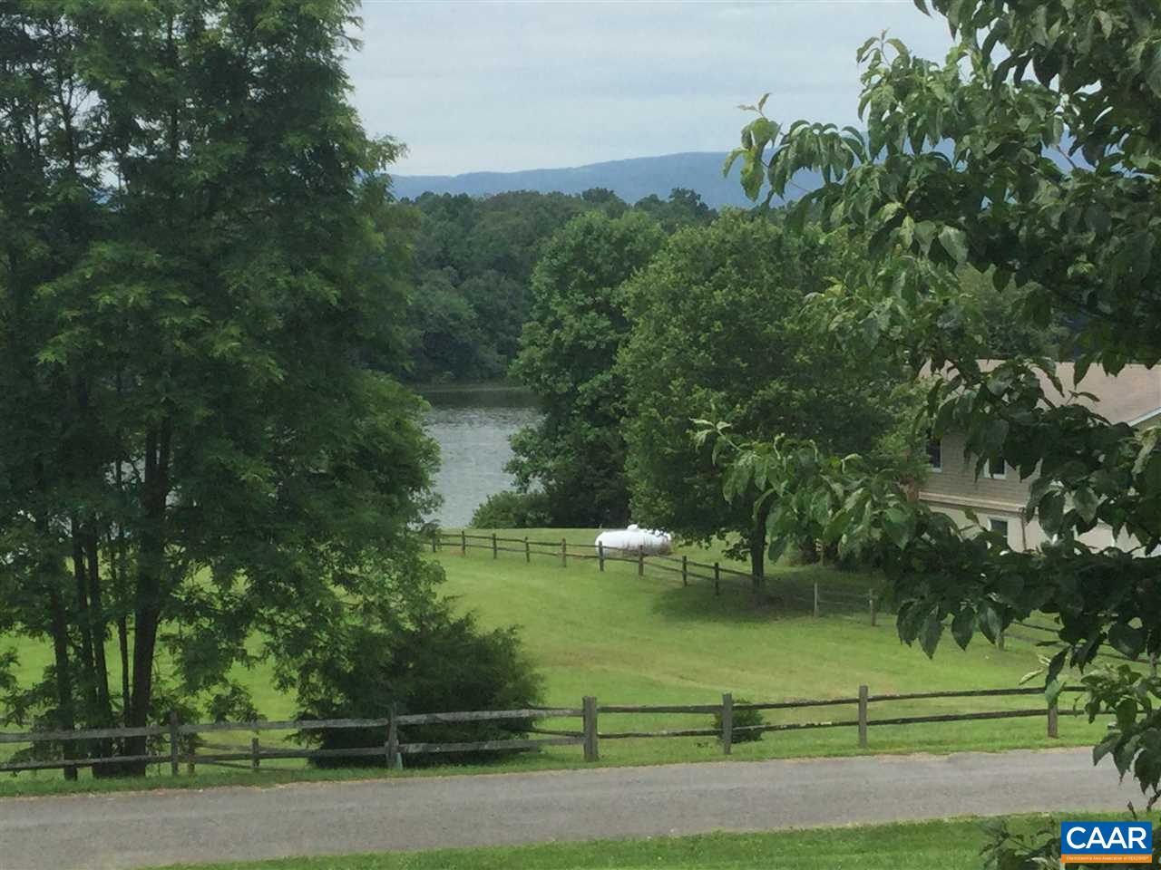 374 Pine Bluff Road Ruckersville, VA 22968 - Photo 16 of 24 a view of a lake