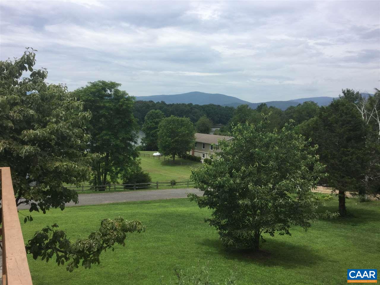 374 Pine Bluff Road Ruckersville, VA 22968 - Photo 20 of 24 a view of a grassy field with trees