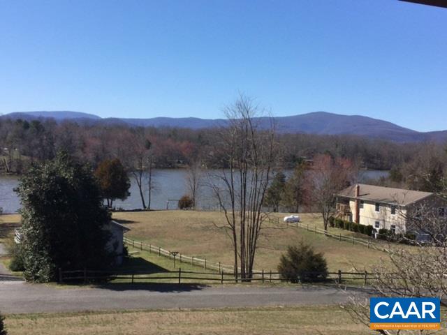 374 Pine Bluff Road Ruckersville, VA 22968 - Photo 24 of 24 a view of a house with a mountain yard