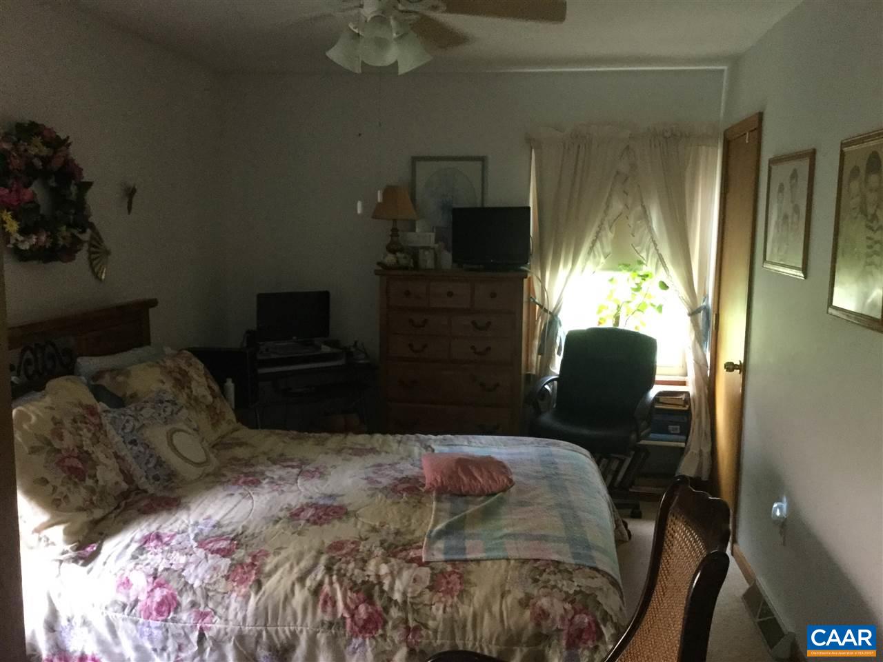 374 Pine Bluff Road Ruckersville, VA 22968 - Photo 5 of 24 a bedroom with a bed window and dresser