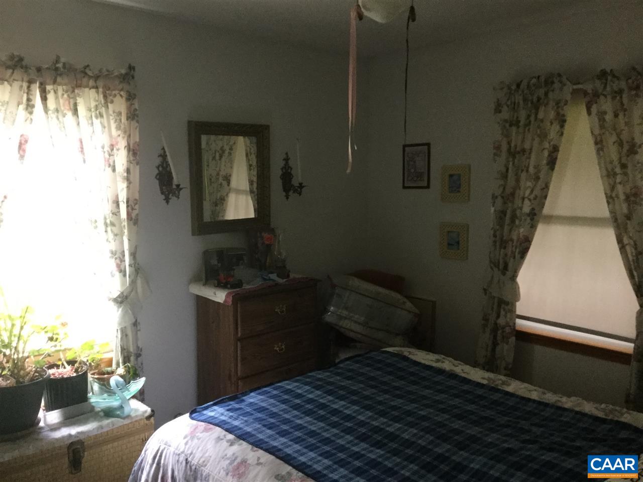 374 Pine Bluff Road Ruckersville, VA 22968 - Photo 6 of 24 a bedroom with a bed and a window