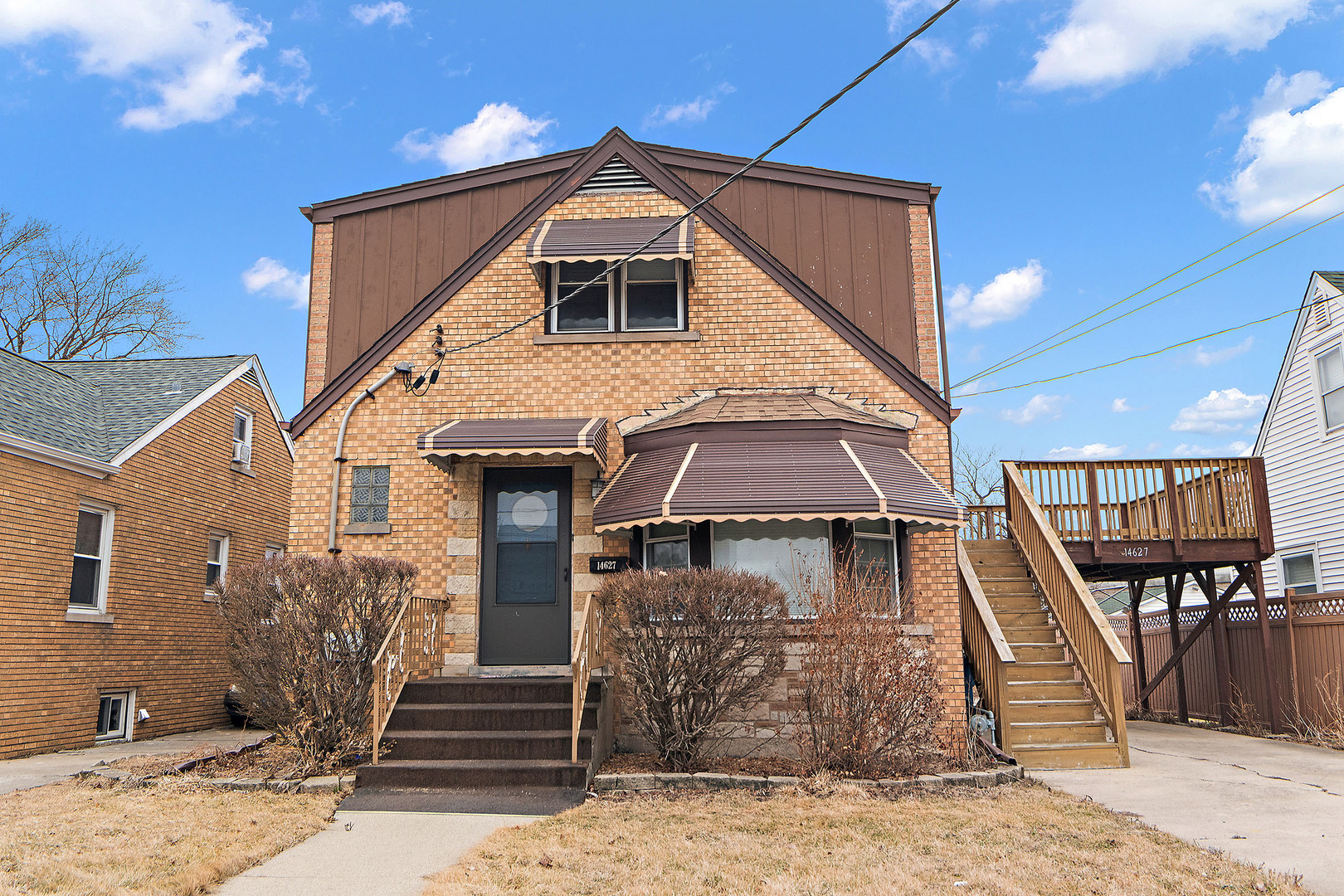 14627 South Short Street Posen, IL 60469 - Photo 2 of 31 a front view of a house with stairs