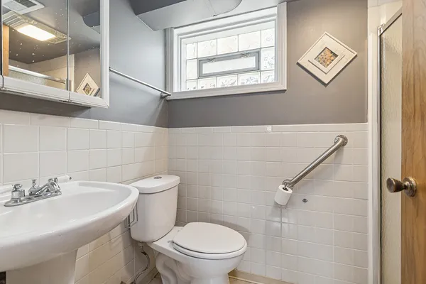 a view of a hallway with staircase