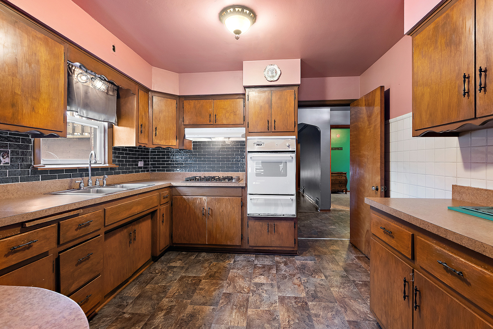 14627 South Short Street Posen, IL 60469 - Photo 9 of 31 a kitchen with sink cabinets and window