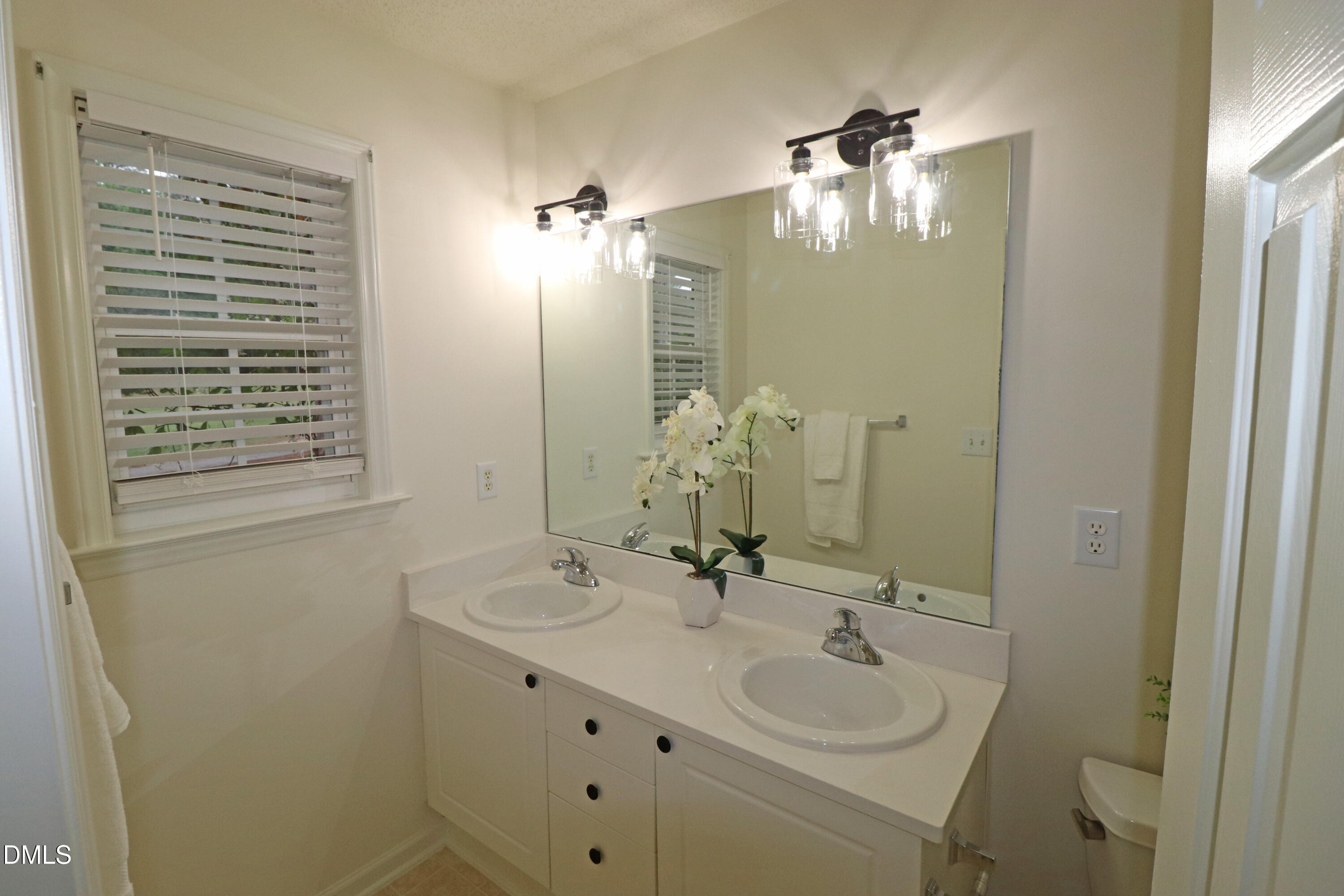 2332 Persimmon Ridge Drive Raleigh, NC 27604 - Photo 19 of 45 Primary bath double vanity