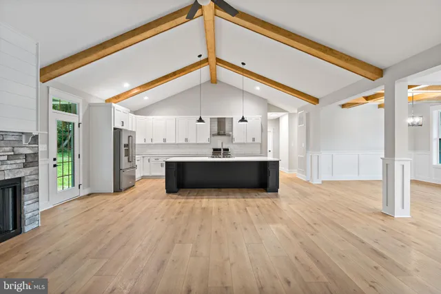 a view of a kitchen with a sink and a kitchen