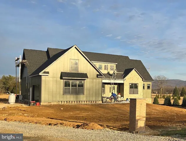 a view of a house with a street
