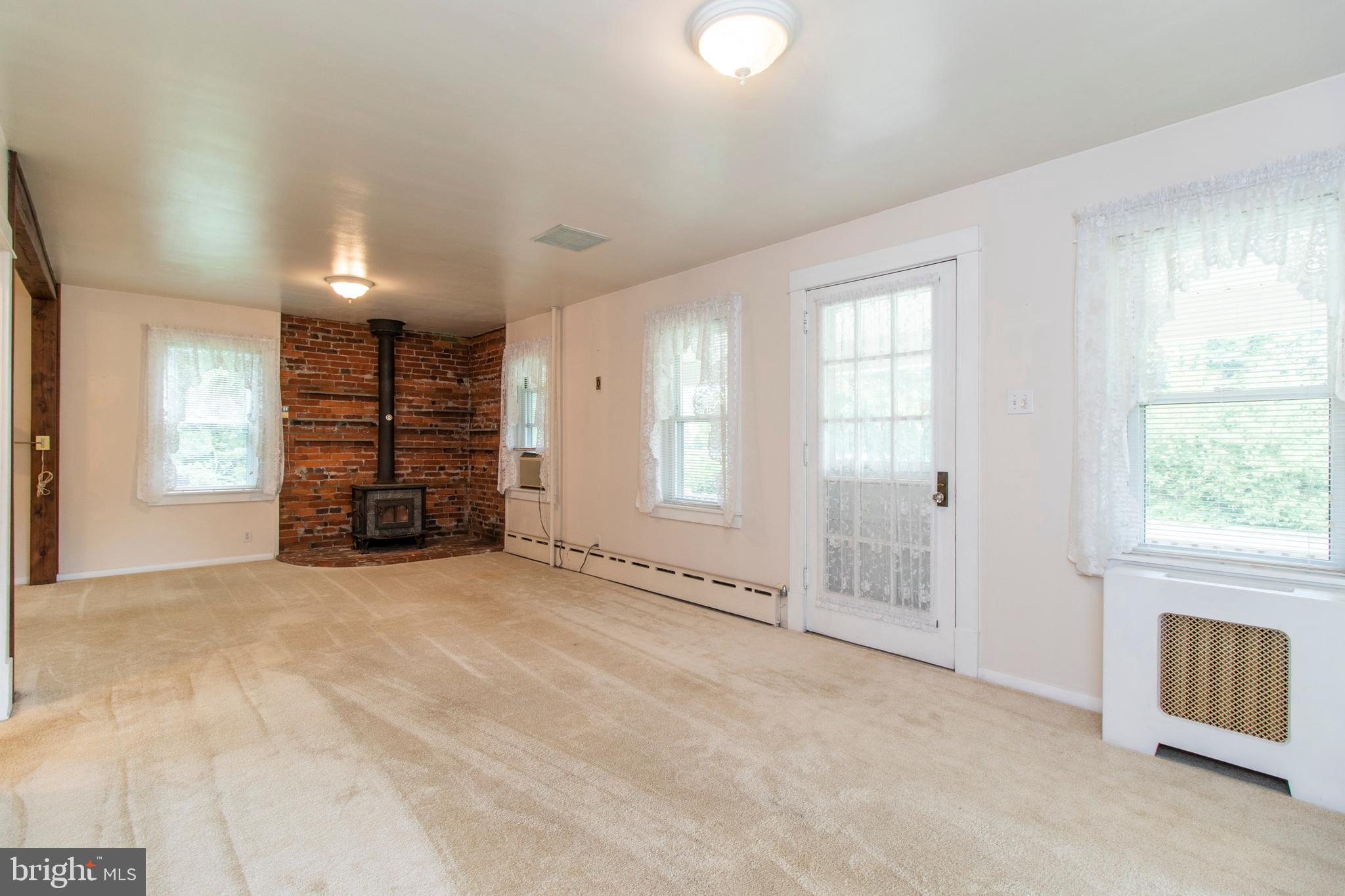 1334 Koffel Road Hatfield, PA 19440 - Photo 4 of 30 Living Room with Wood Stove