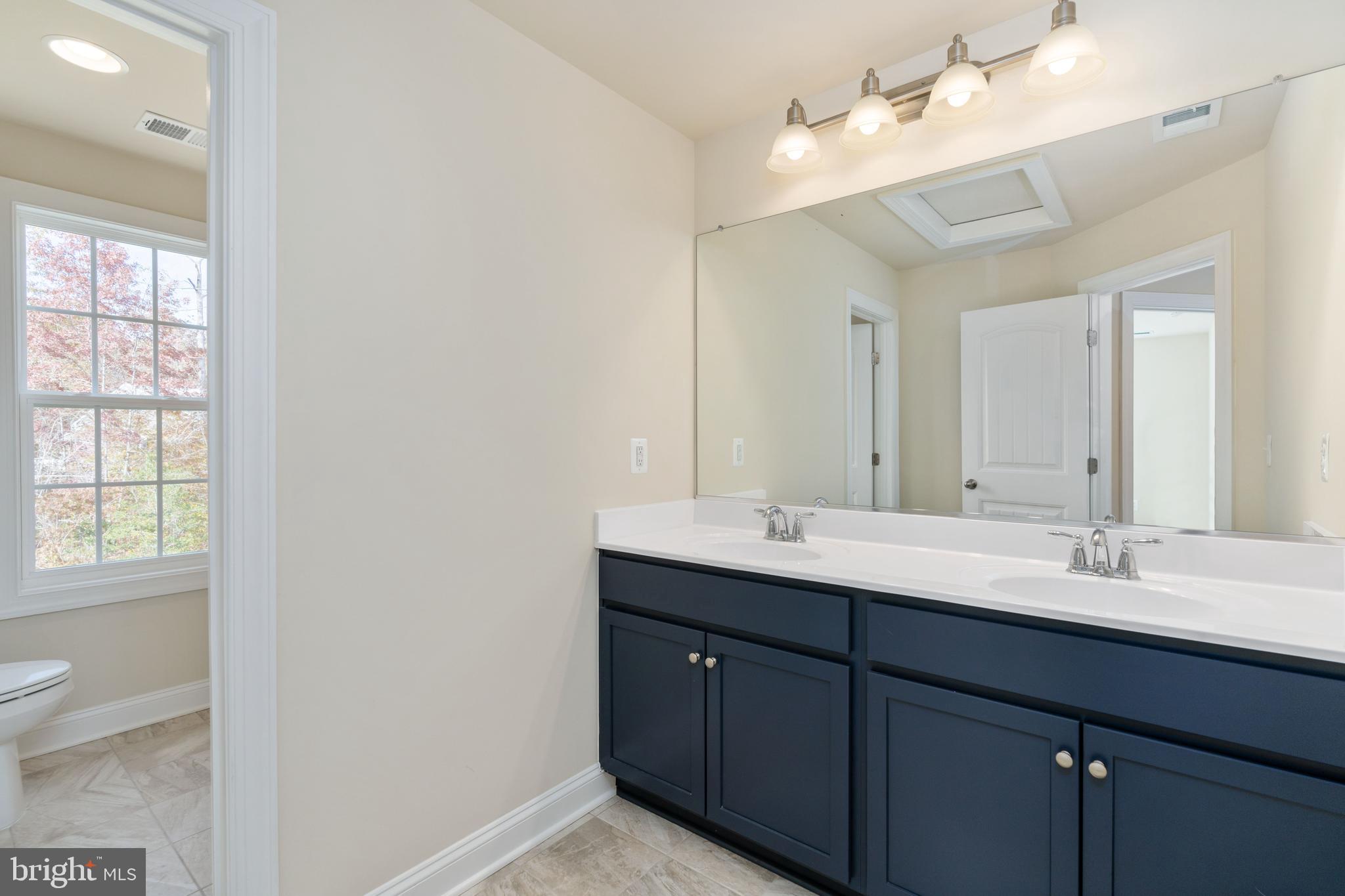 214 Kellan Drive Fredericksburg, VA 22406 - Photo 47 of 81 Upstairs bath with double sinks