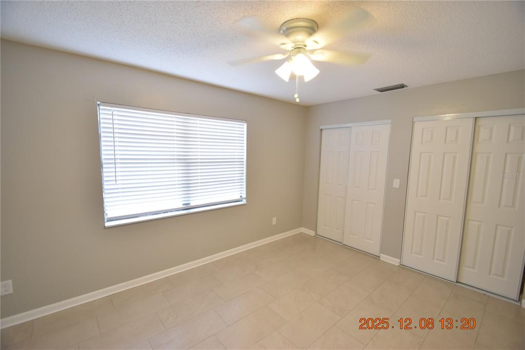 705 2nd Avenue Northwest, Unit B Ruskin, FL 33570 - Photo 14 of 29 a view of an empty room with a window