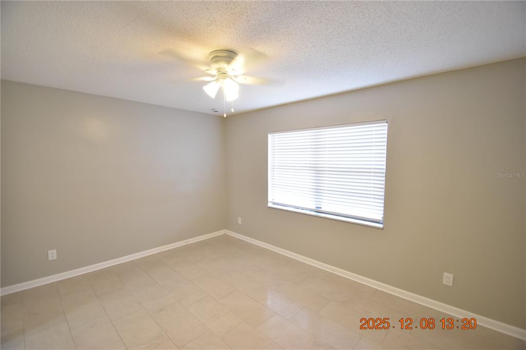 705 2nd Avenue Northwest, Unit B Ruskin, FL 33570 - Photo 15 of 29 an empty room with a window