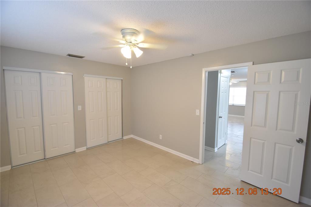 705 2nd Avenue Northwest, Unit B Ruskin, FL 33570 - Photo 17 of 29 wooden floor in an empty room