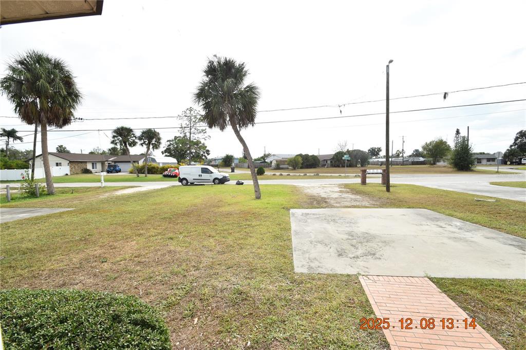 705 2nd Avenue Northwest, Unit B Ruskin, FL 33570 - Photo 29 of 29 a view of a lake with a big yard