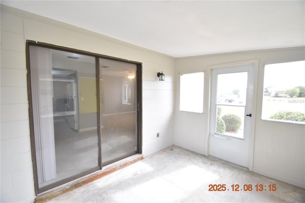 705 2nd Avenue Northwest, Unit B Ruskin, FL 33570 - Photo 4 of 29 a view of an empty room with a window