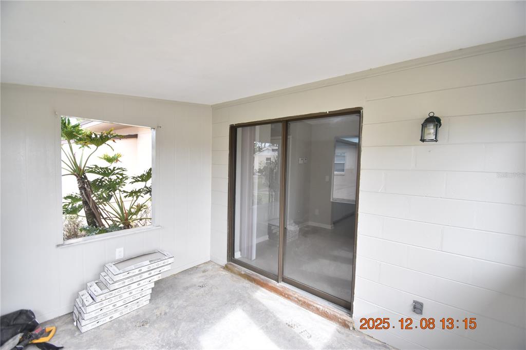 705 2nd Avenue Northwest, Unit B Ruskin, FL 33570 - Photo 5 of 29 a view of an entryway with wooden floor