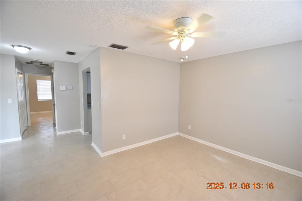 705 2nd Avenue Northwest, Unit B Ruskin, FL 33570 - Photo 7 of 29 wooden floor in an empty room