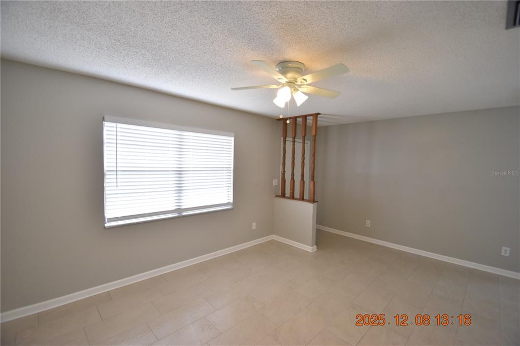 705 2nd Avenue Northwest, Unit B Ruskin, FL 33570 - Photo 9 of 29 an empty room with a window