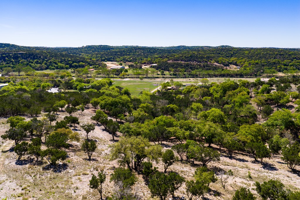0 Pawnee Path Hunt, TX 78024 - Photo 24 of 32 a view of a city with mountains in the background