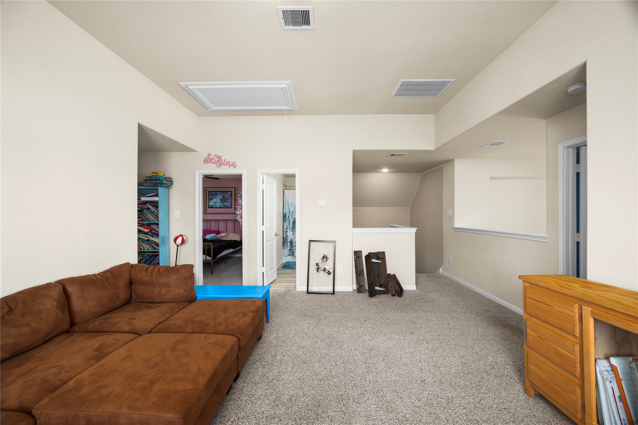 20272 Torrey Pines Lane Cleveland, TX 77327 - Photo 11 of 34 a living room with furniture and a couch