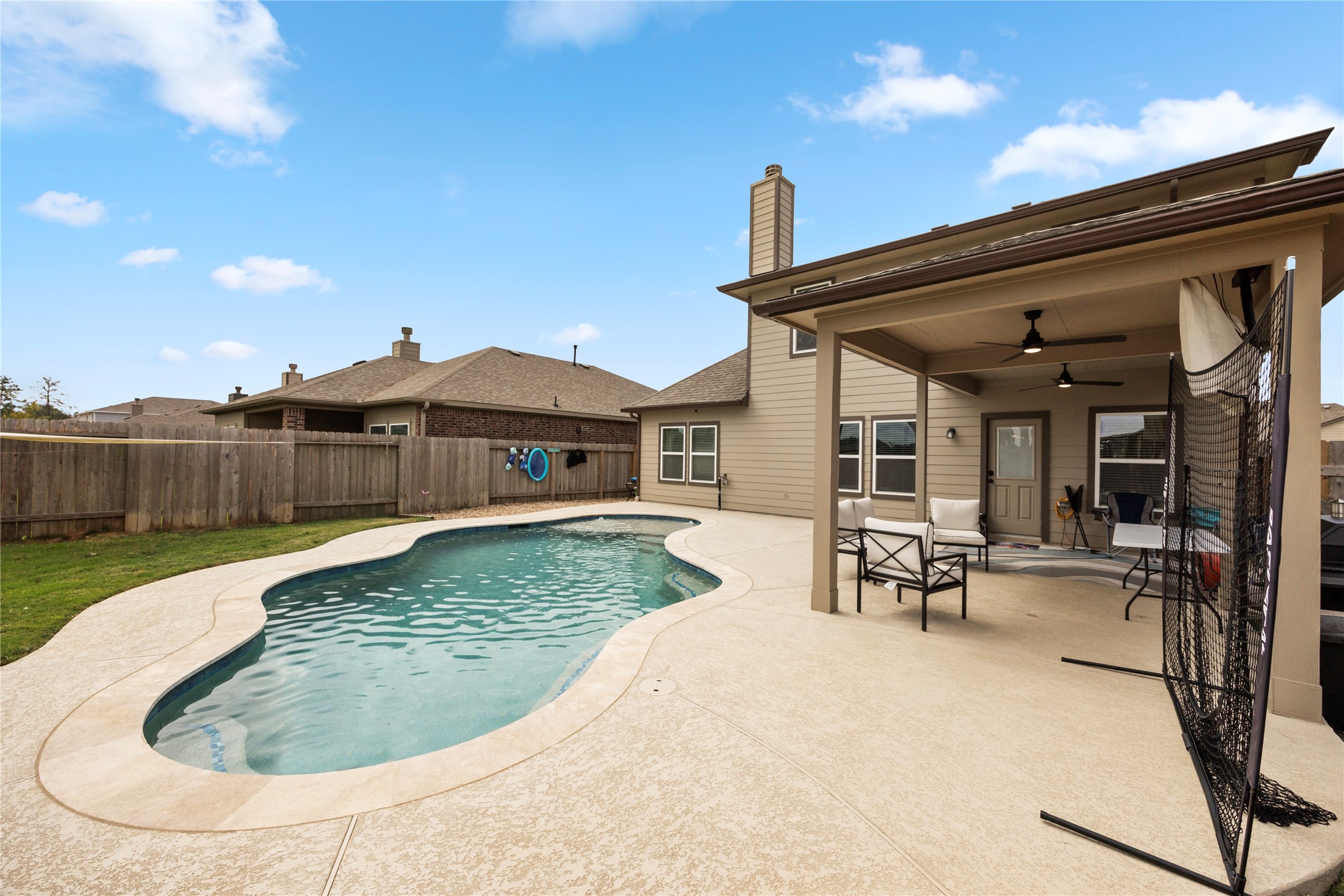 20272 Torrey Pines Lane Cleveland, TX 77327 - Photo 14 of 34 a view of a house with backyard and sitting area