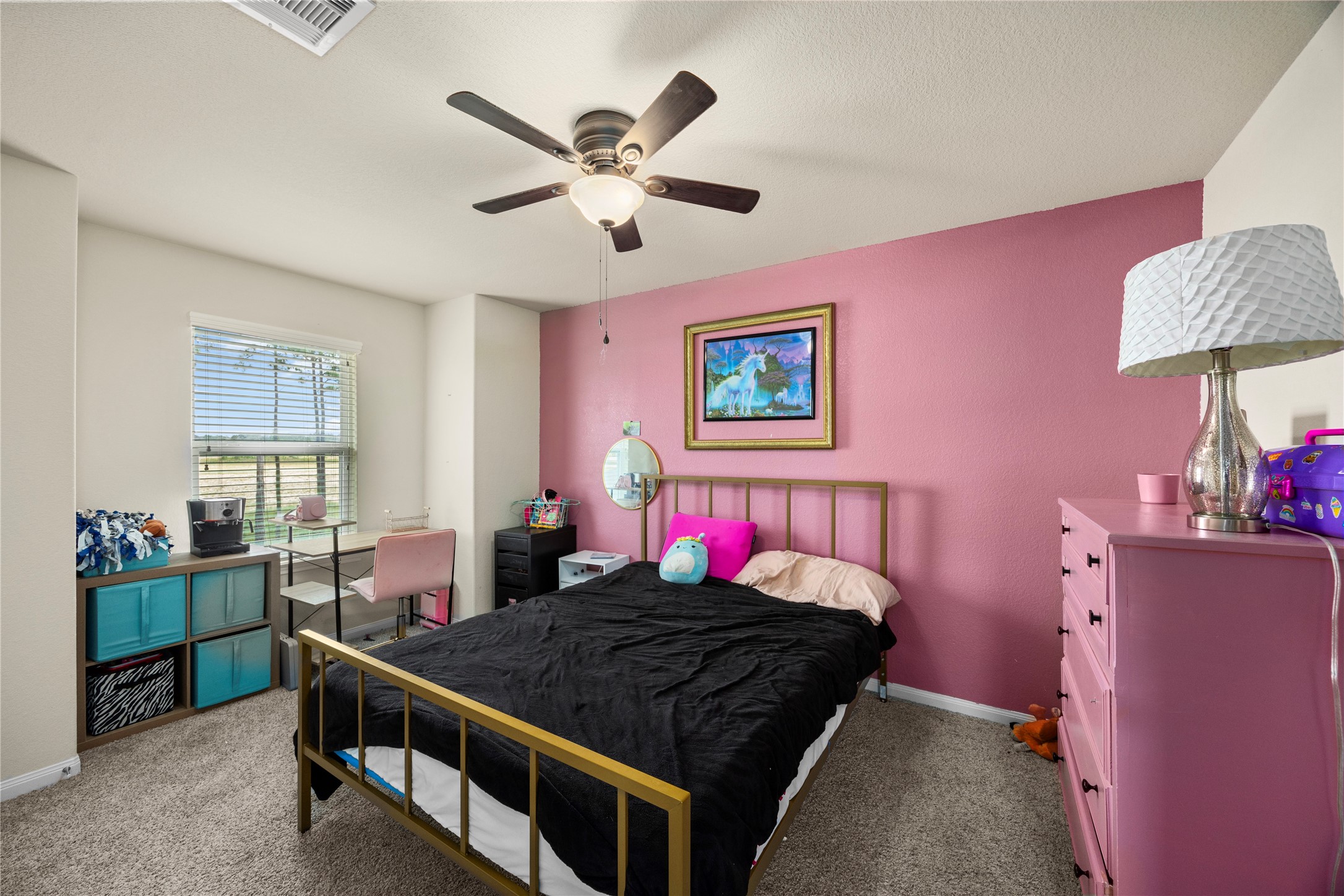 20272 Torrey Pines Lane Cleveland, TX 77327 - Photo 26 of 34 a bed room with a bed window and dresser
