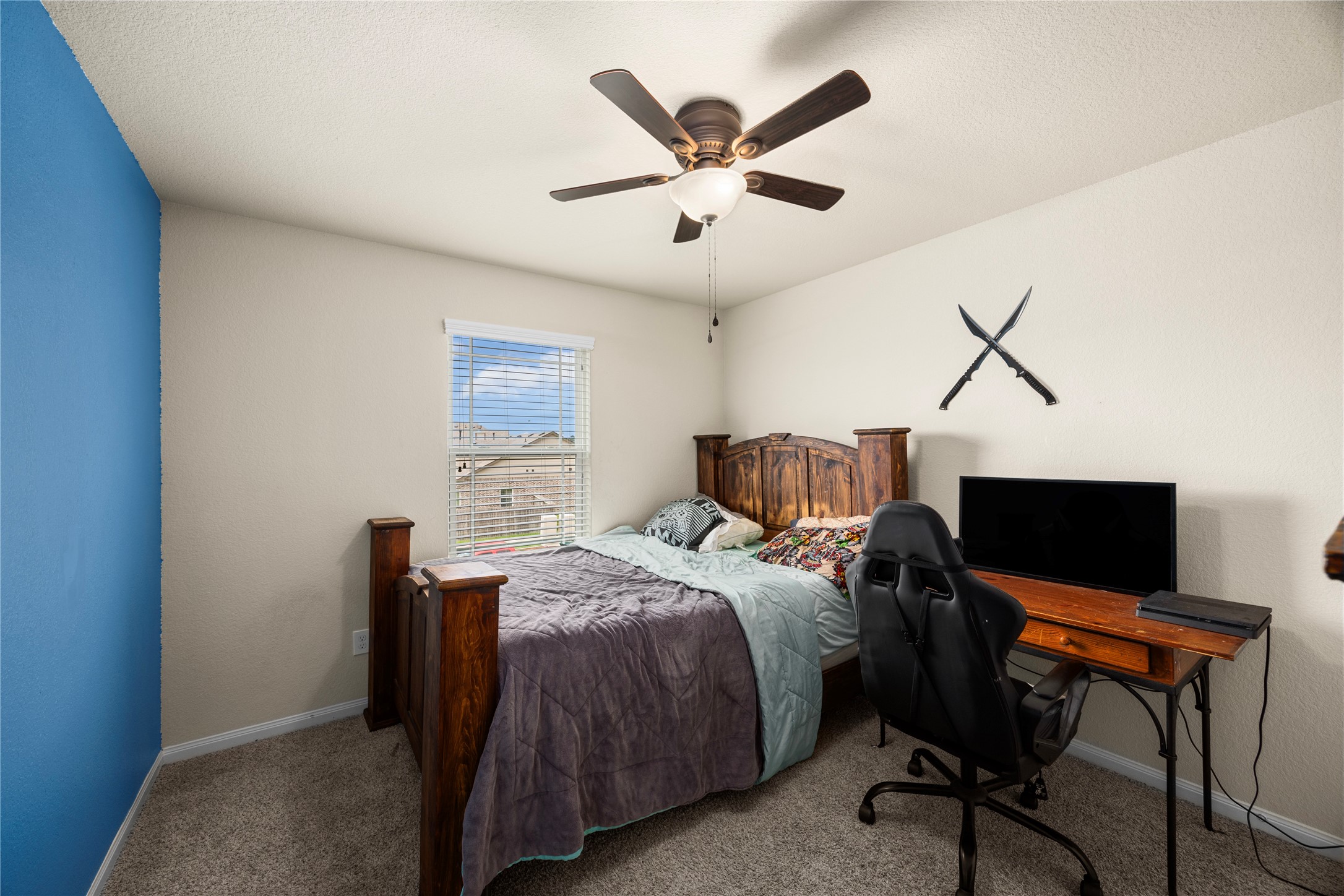 20272 Torrey Pines Lane Cleveland, TX 77327 - Photo 28 of 34 a bed room with a bed and a tv