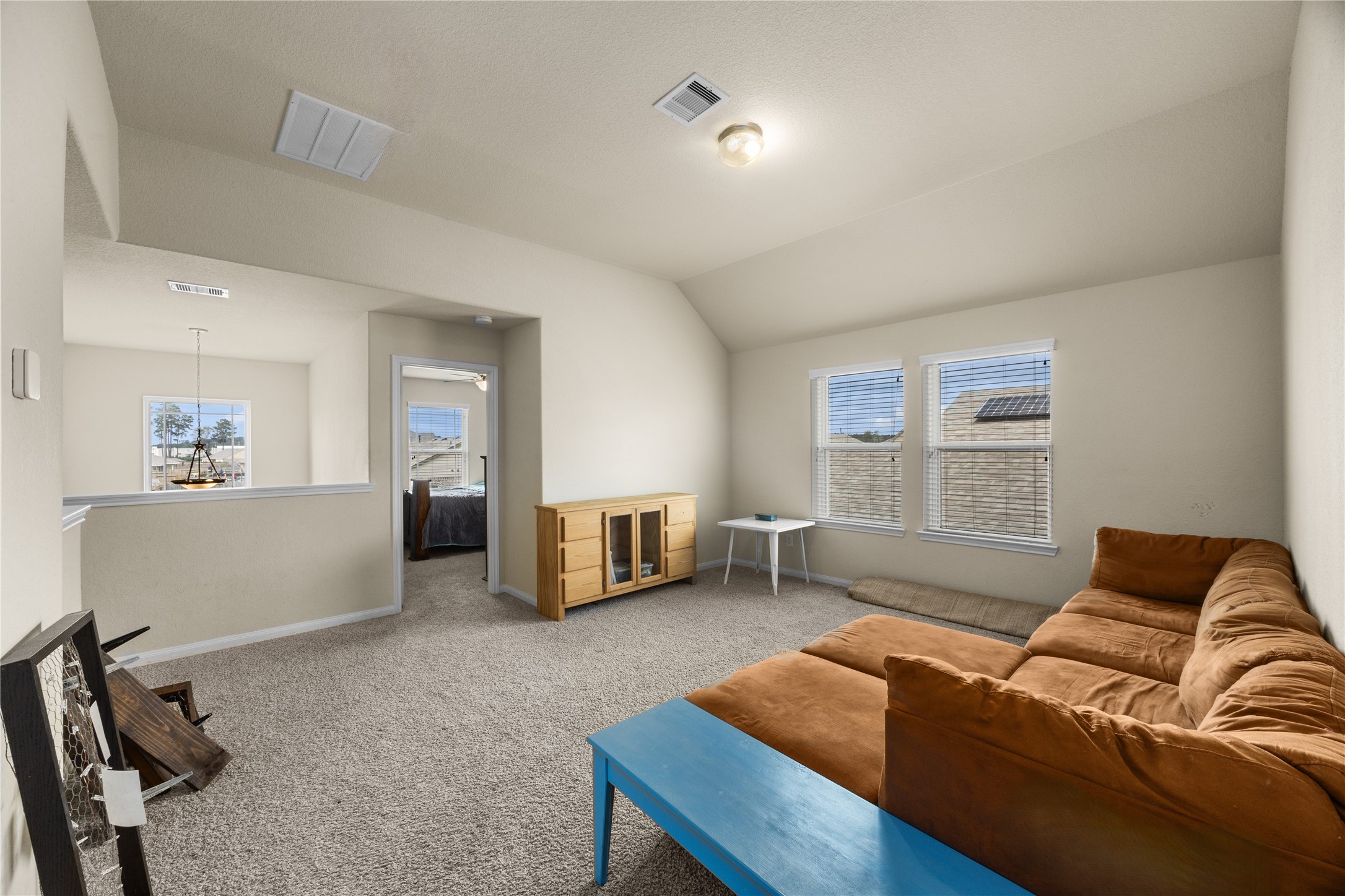 20272 Torrey Pines Lane Cleveland, TX 77327 - Photo 10 of 34 a living room with furniture and a window