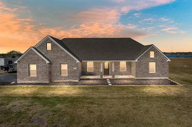 a front view of house with yard