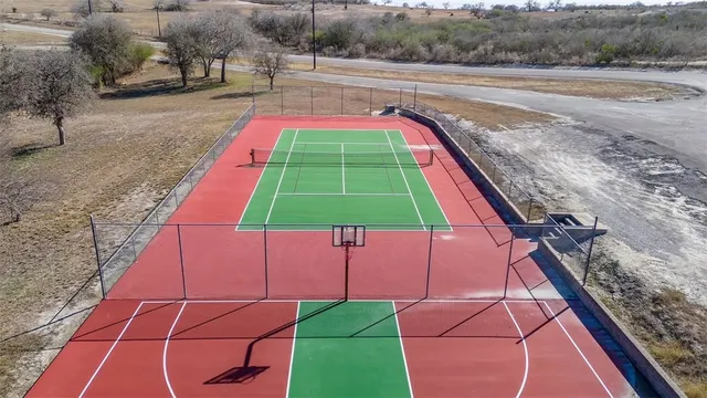 a view of an outdoor space and tennis court