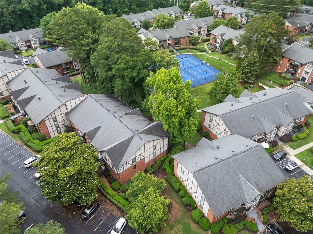 6851 Roswell Road, Unit H26 Atlanta, GA 30328 - Photo 39 of 49 an aerial view of a house with a garden