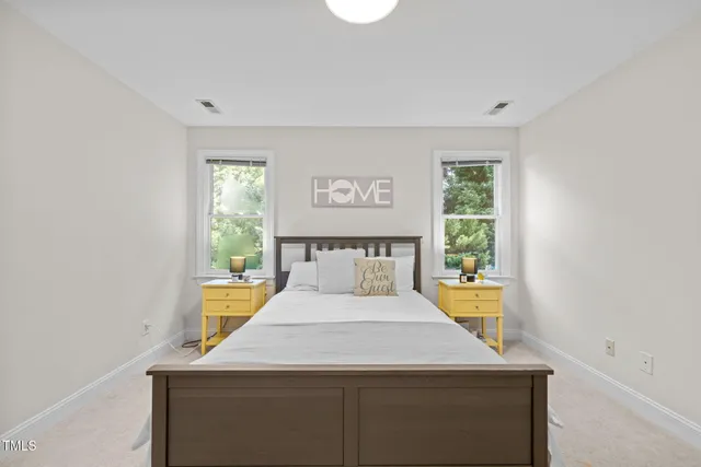 a view of a kitchen with dining table and chairs