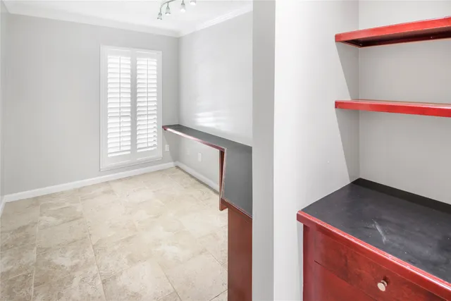 a front view of a house with a garden and porch