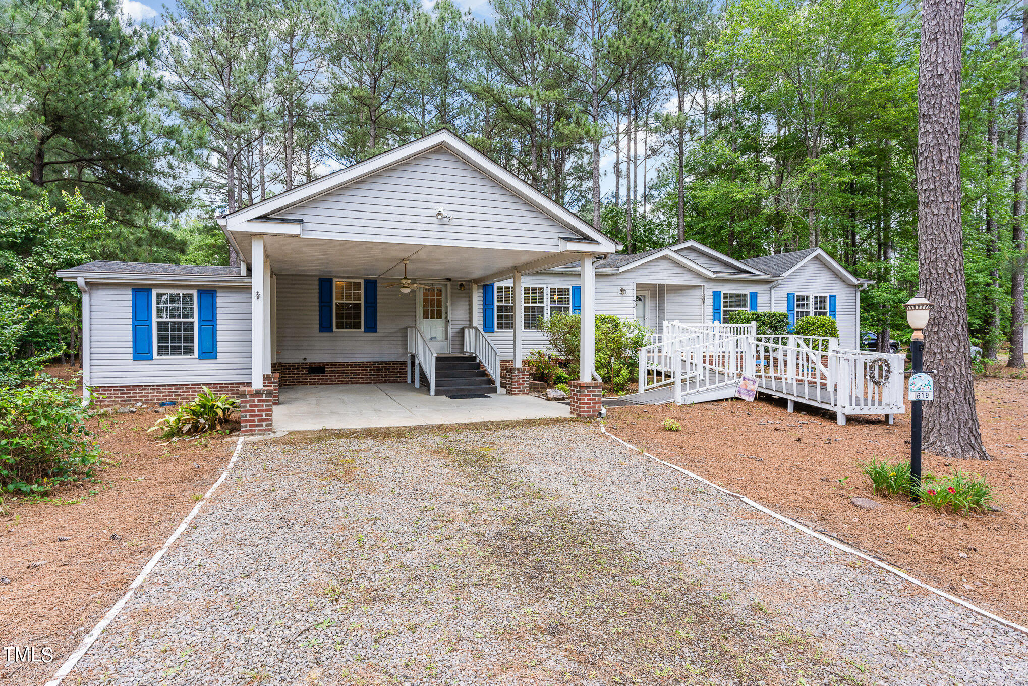 619 Ridge View Drive Cameron, NC 28326 - Photo 2 of 30 a view of a house with a yard and large tree
