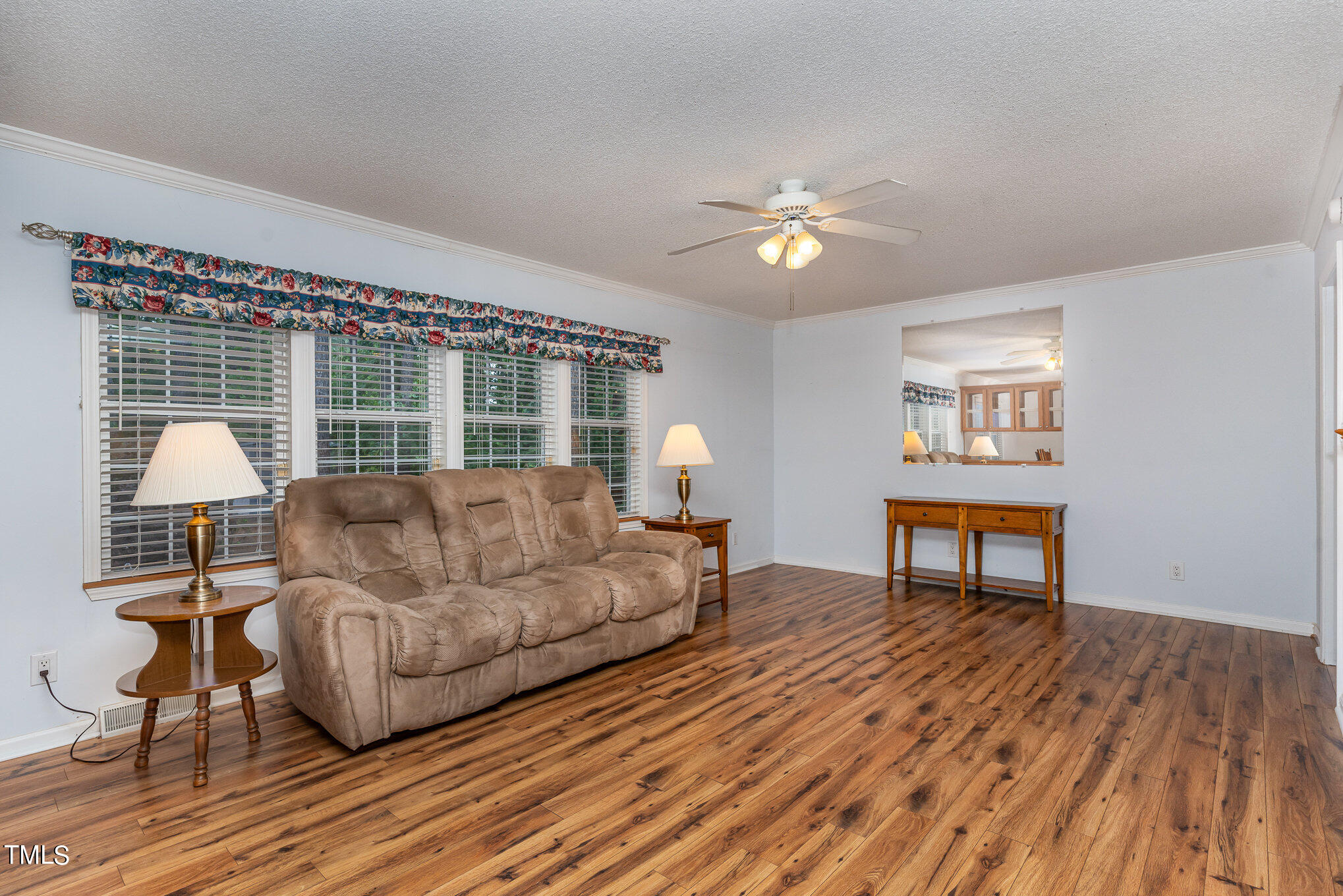 619 Ridge View Drive Cameron, NC 28326 - Photo 7 of 30 a living room with furniture and a wooden floor