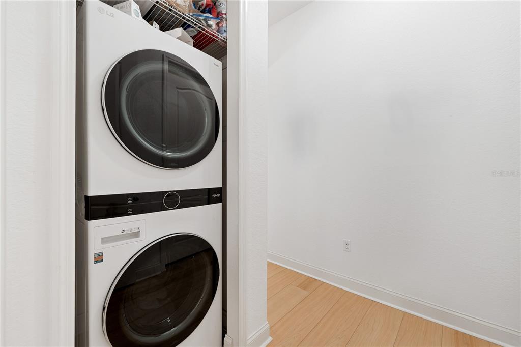 1819 Common Way Road, Unit 203 Orlando, FL 32814 - Photo 22 of 23 a close up view of a washer and dryer