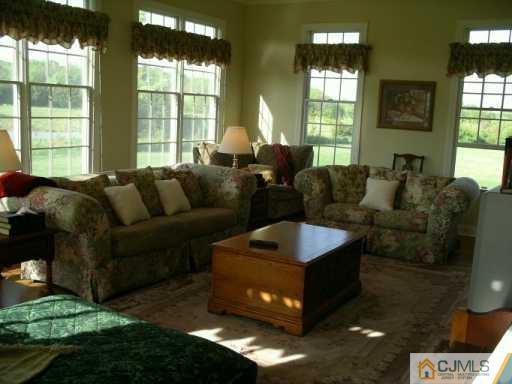 54 Springhill Road Skillman, NJ 08558 - Photo 5 of 5 a living room with furniture and a window