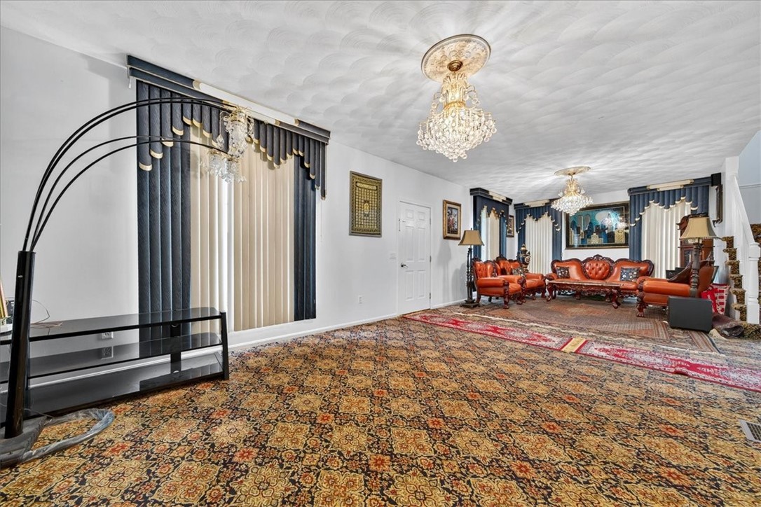 14 Audubon Lane Coventry, RI 02831 - Photo 22 of 41 huge great room on first floor, Half could be formal dining room