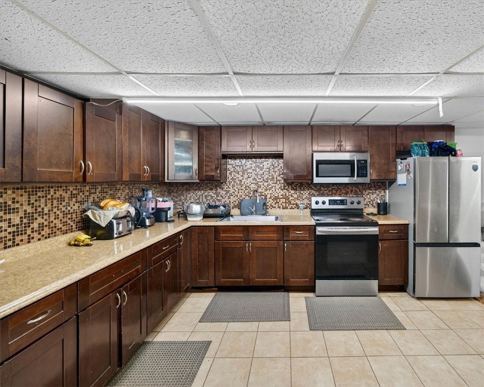 14 Audubon Lane Coventry, RI 02831 - Photo 35 of 41 lower level kitchen