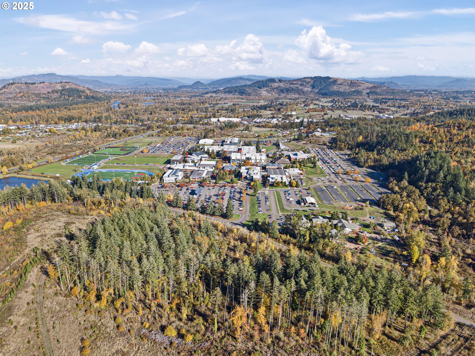 0 Gonyea Road Eugene, OR 97405 - Photo 14 of 37 a view of a city with mountains in the background
