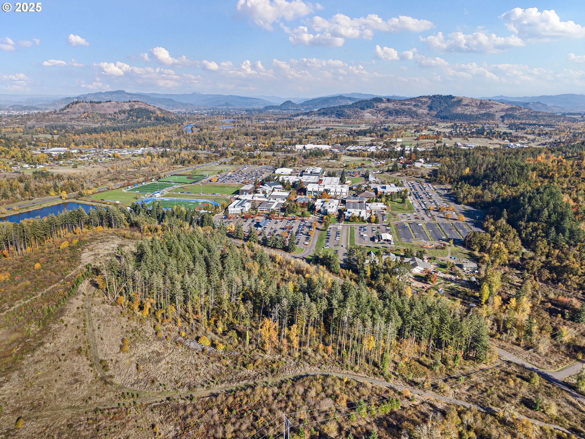 0 Gonyea Road Eugene, OR 97405 - Photo 36 of 37 a view of a city with mountains in the background