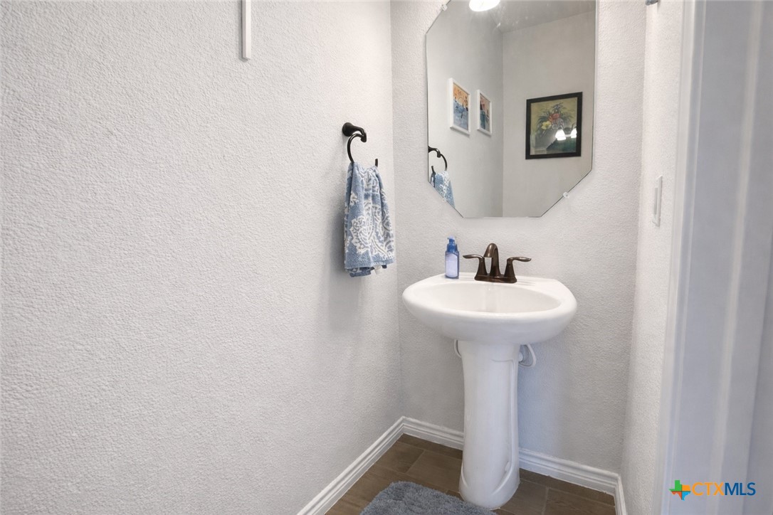 1201 Roma Street Harker Heights, TX 76548 - Photo 18 of 33 a bathroom with a sink and a mirror