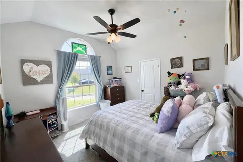 a room with furniture and a window