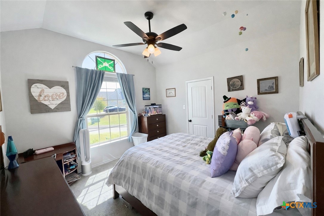 1201 Roma Street Harker Heights, TX 76548 - Photo 19 of 33 a bed room with a bed and a window