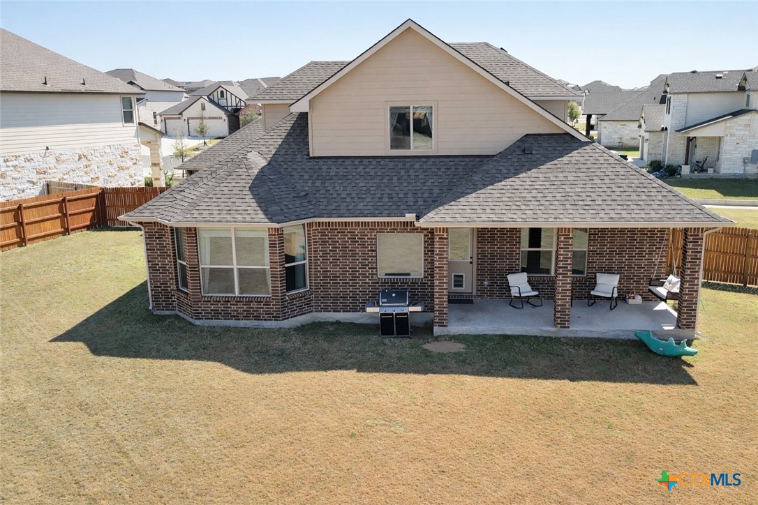 1201 Roma Street Harker Heights, TX 76548 - Photo 28 of 33 a view of a house with backyard and sitting area