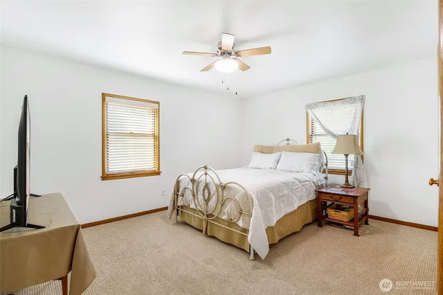 a bed room with a bed and a couch