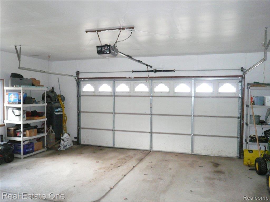 2510 East Rose Center Road Highland, MI 48356 - Photo 15 of 18 2 1/2 car attached garage