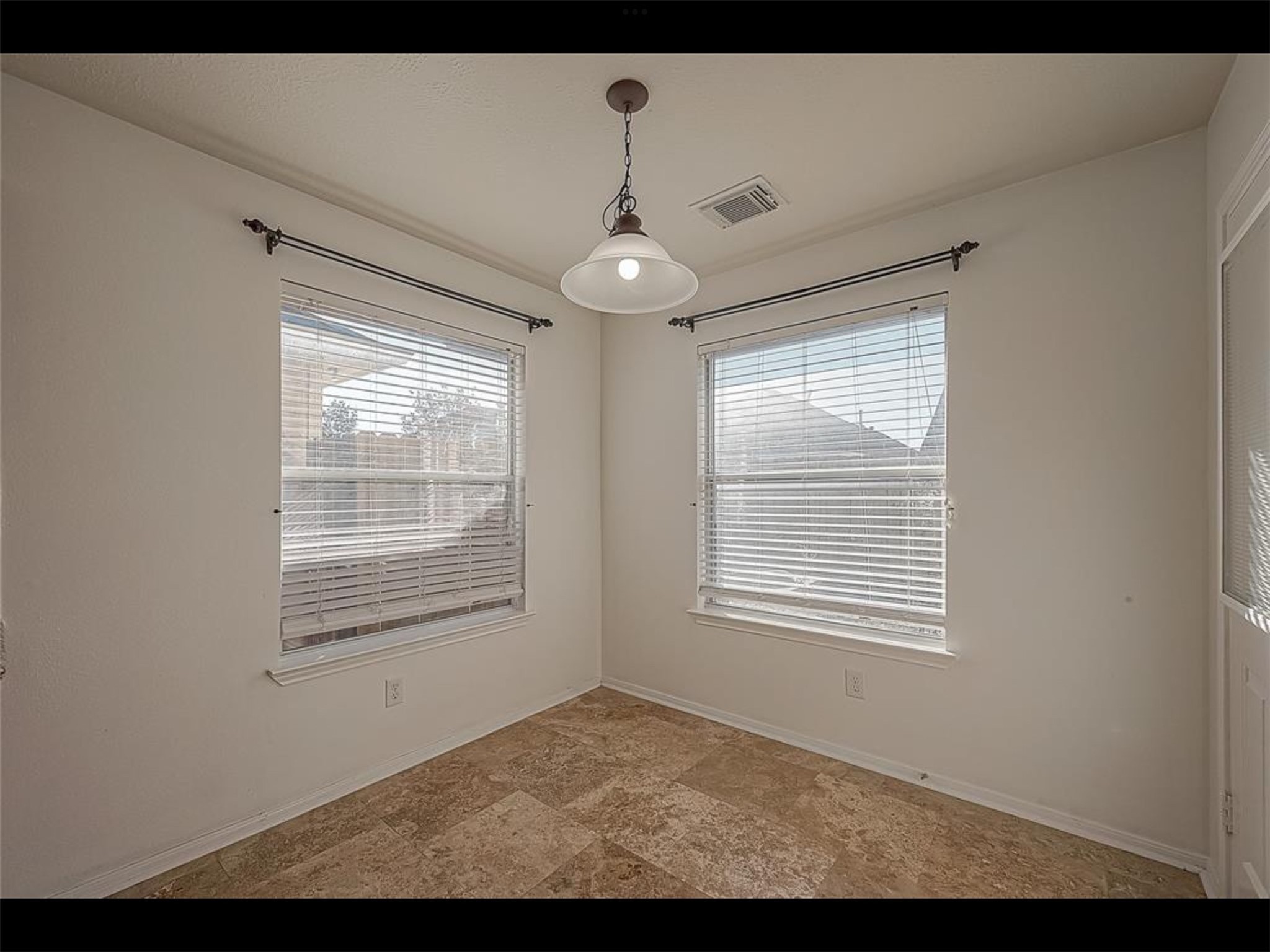 10819 Waterfern Court Houston, TX 77064 - Photo 13 of 37 a view of an empty room with windows