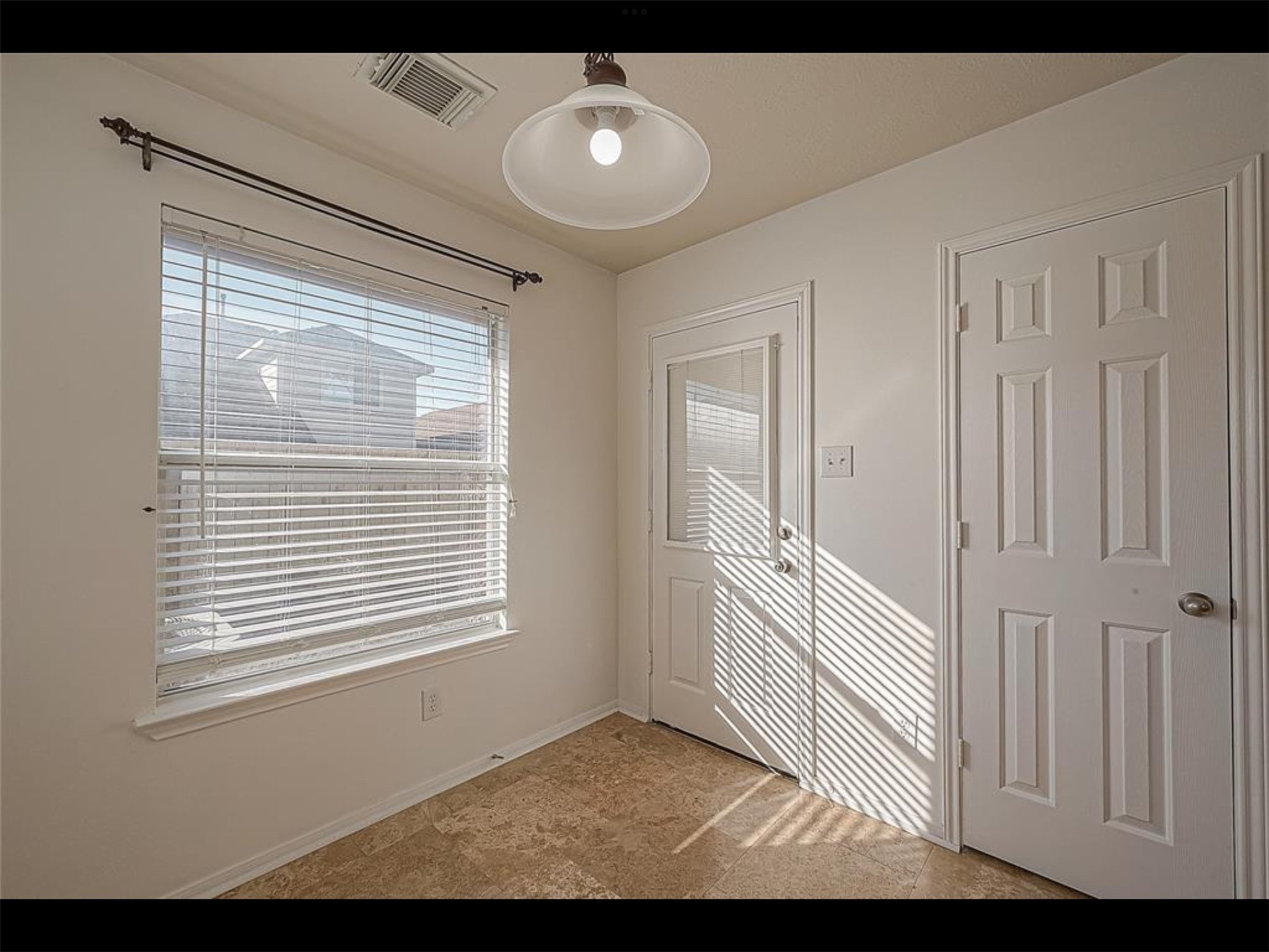 10819 Waterfern Court Houston, TX 77064 - Photo 14 of 37 a view of a livingroom with wooden floor and a window