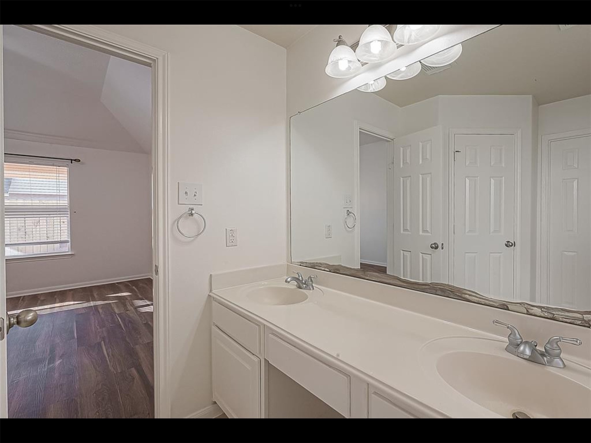 10819 Waterfern Court Houston, TX 77064 - Photo 18 of 37 a bathroom with a sink and a mirror