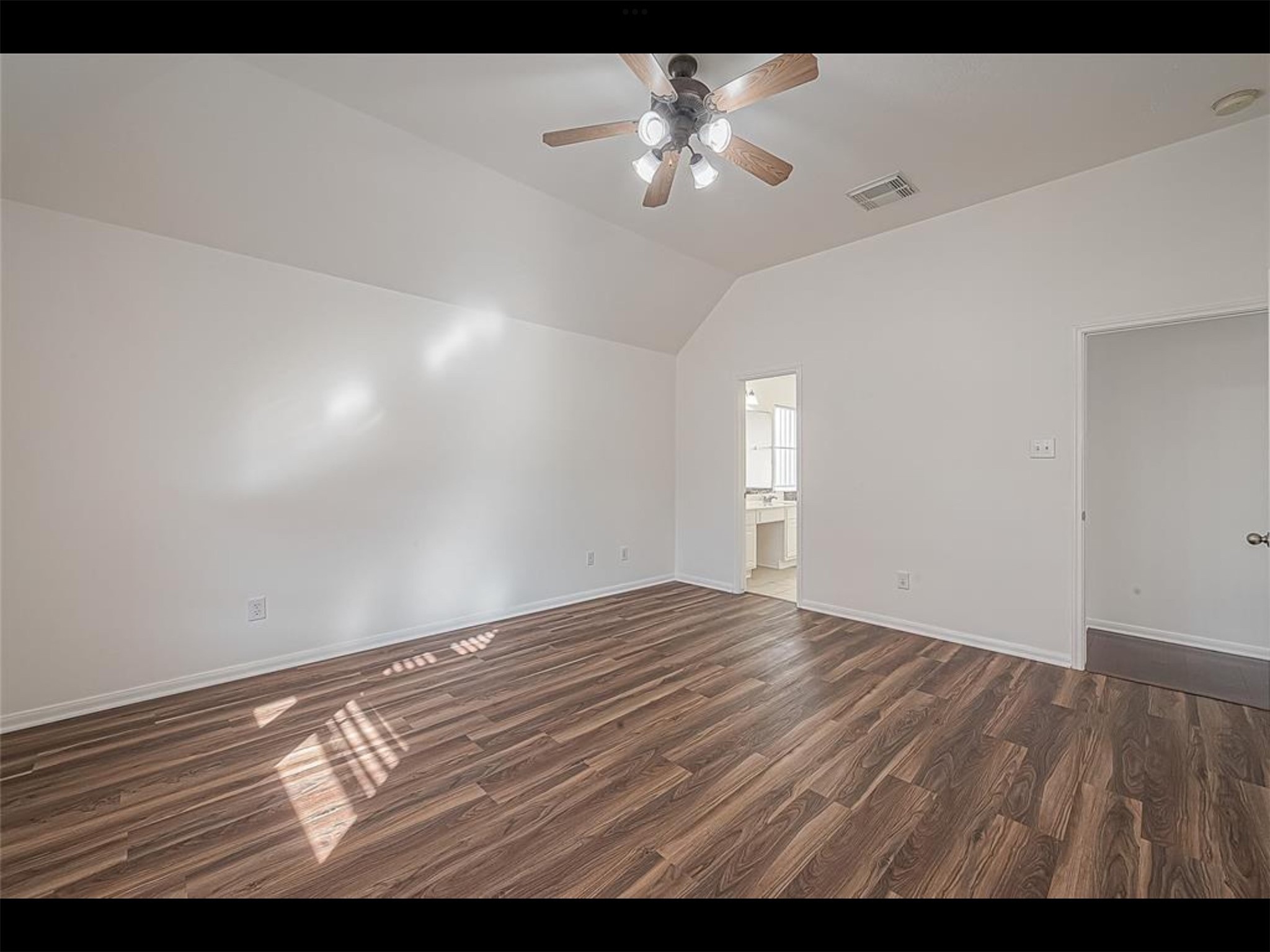 10819 Waterfern Court Houston, TX 77064 - Photo 19 of 37 a view of empty room with wooden floor
